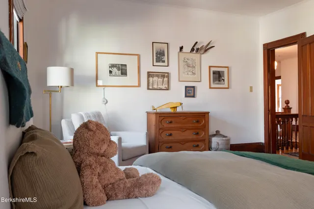 a living room with furniture and windows