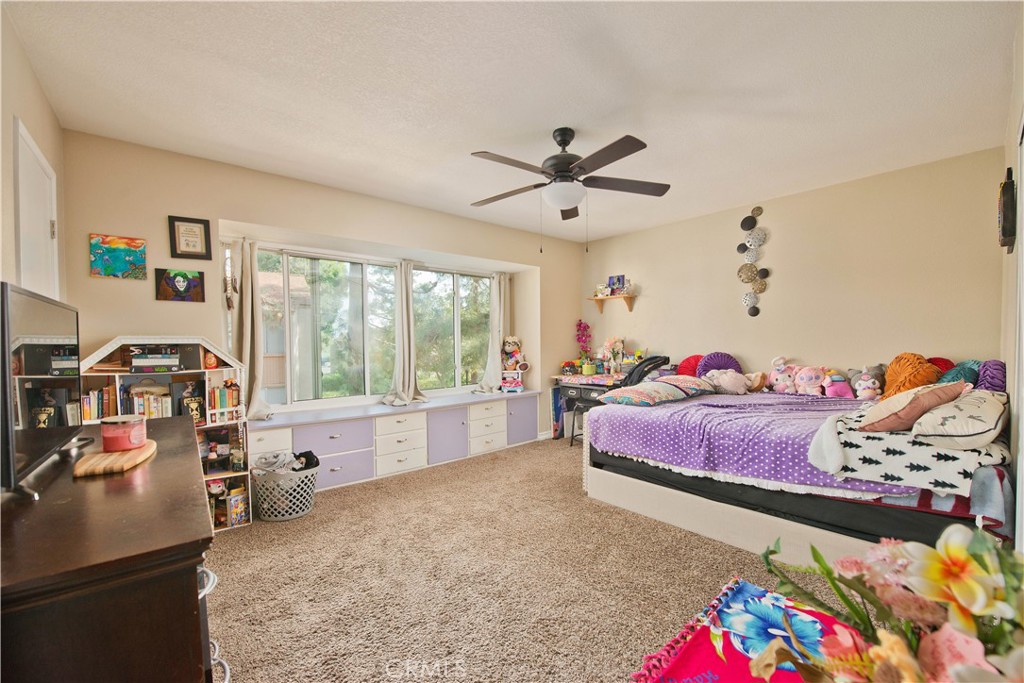 1124 Okapi Lane Ventura, CA 93003 - Photo 16 of 22 a bedroom with furniture and a large window