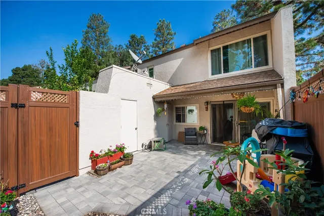 an outdoor space with potted plants
