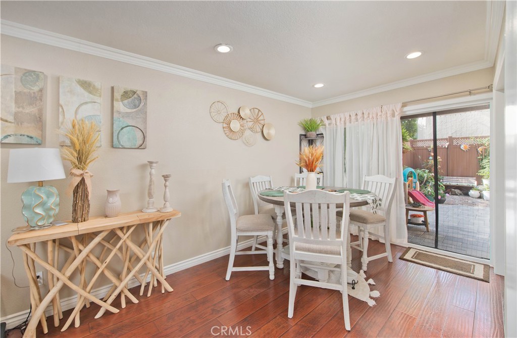 1124 Okapi Lane Ventura, CA 93003 - Photo 9 of 22 a view of a dining room with furniture window and wooden floor