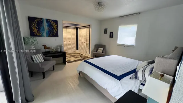 a room with a bed and a couch