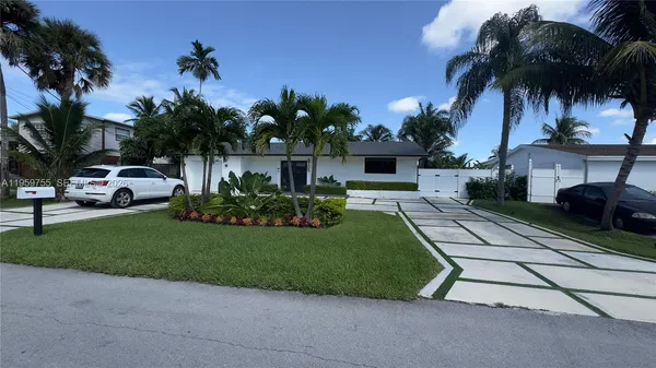 a house with garden in front of it