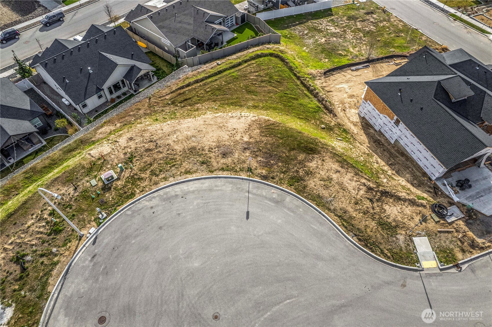 978 Spring Mountain Drive Wenatchee, WA 98801 - Photo 6 of 8 an aerial view of a house