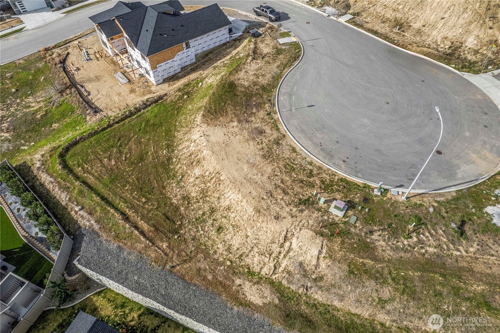 978 Spring Mountain Drive Wenatchee, WA 98801 - Photo 7 of 8 a view of a swimming pool with a yard