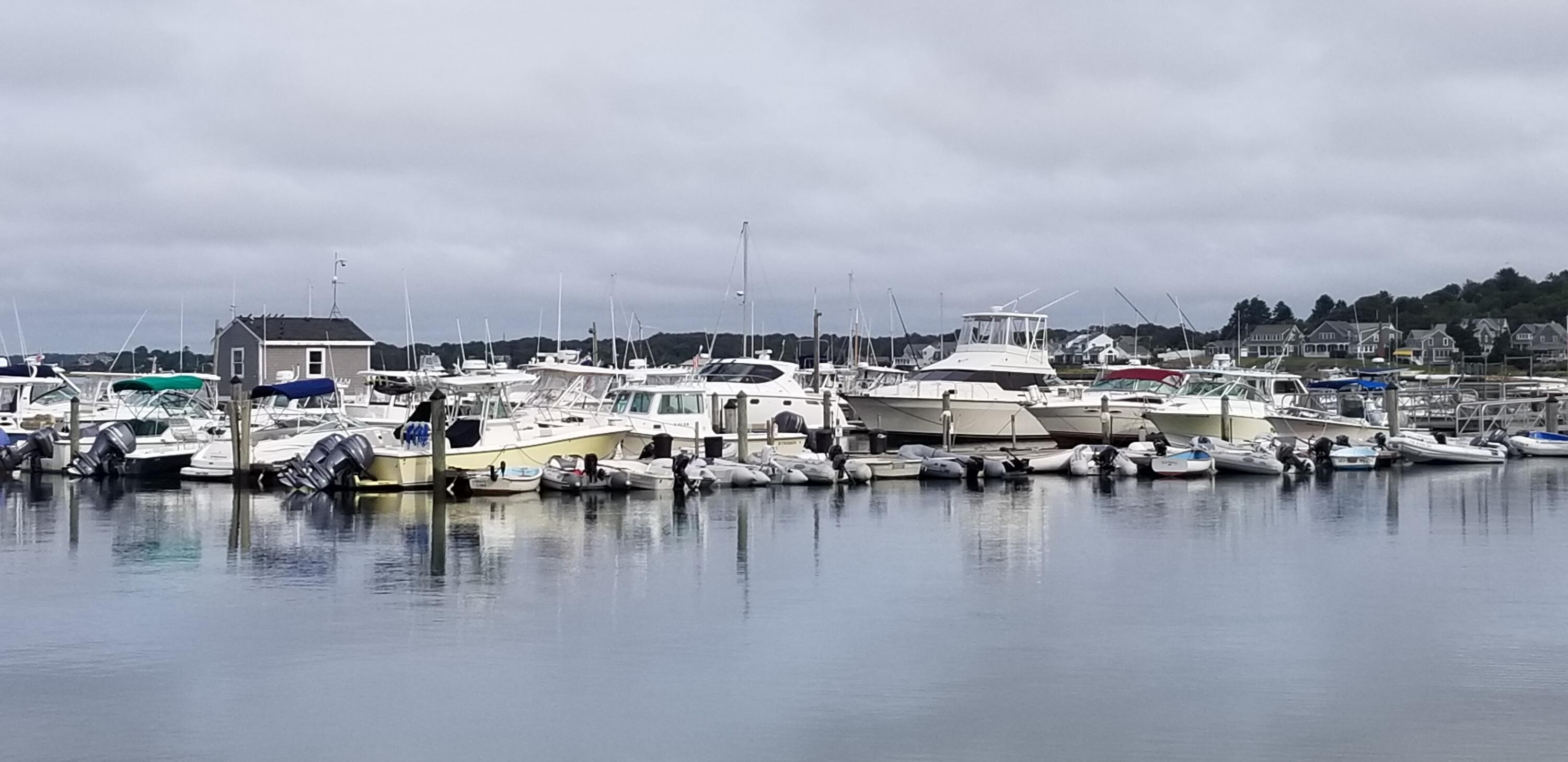 3 1st Street Bourne, MA 02559 - Photo 4 of 9 a view of water with boats and trees in all around