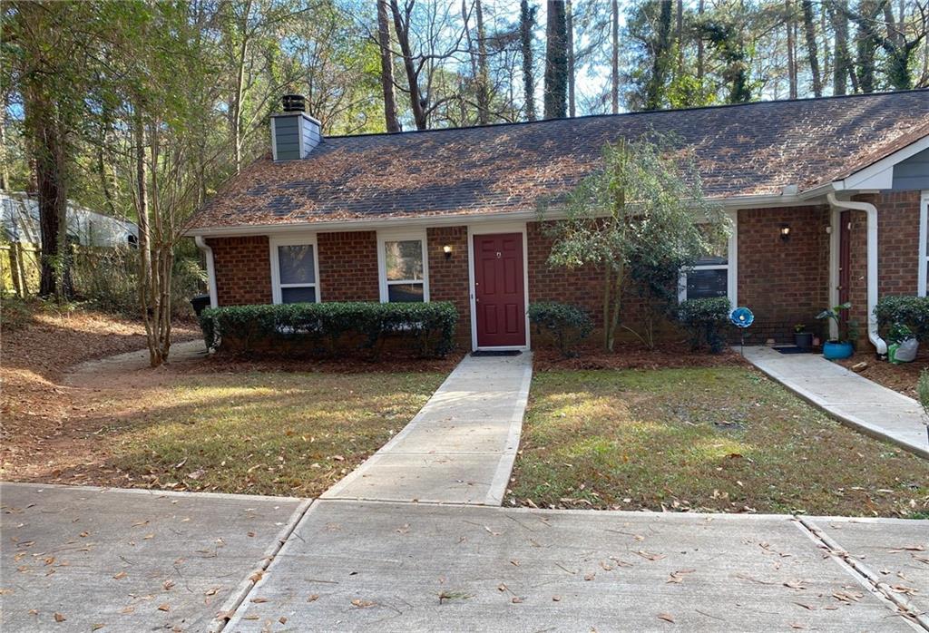 5458 Terrace Garden Way, Unit A Norcross, GA 30071 - Photo 2 of 27 a view of a house with a garden