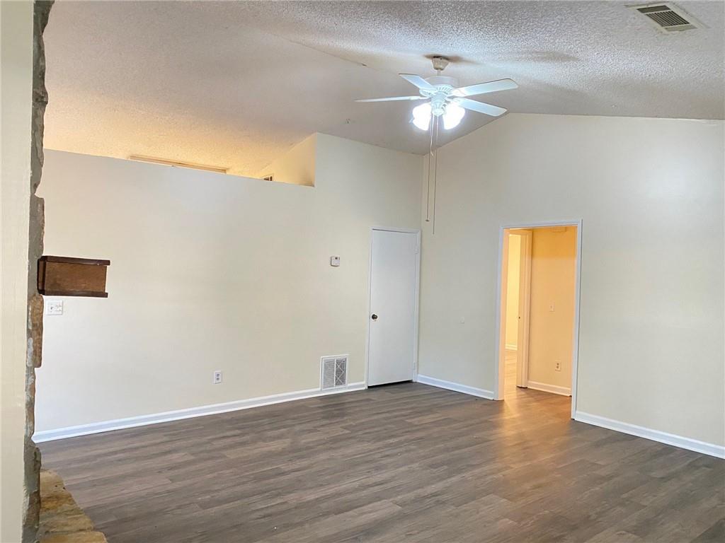 5458 Terrace Garden Way, Unit A Norcross, GA 30071 - Photo 24 of 27 a view of a livingroom with a chandelier fan