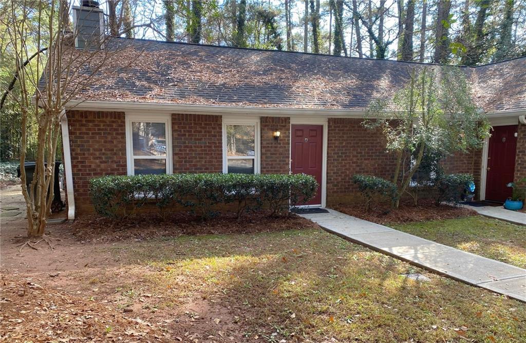 5458 Terrace Garden Way, Unit A Norcross, GA 30071 - Photo 3 of 27 a view of a house with brick walls