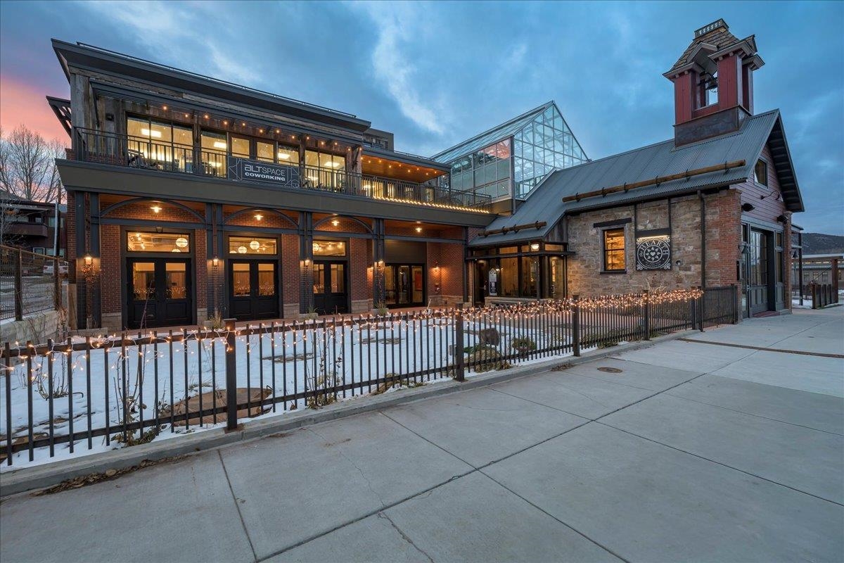 185 North Lena Street, Unit CONDO D Ridgway, CO 81432 - Photo 1 of 17 a view of a house with large windows