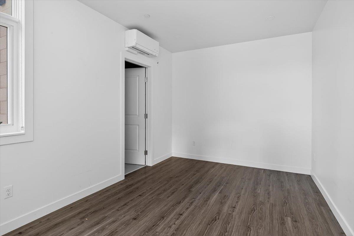 185 North Lena Street, Unit CONDO D Ridgway, CO 81432 - Photo 11 of 17 a view of a small space with wooden floor and a window