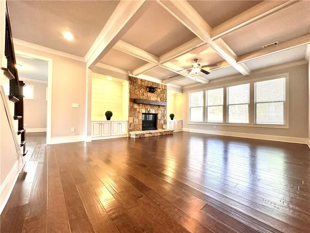 a kitchen with counter top space cabinets and appliances