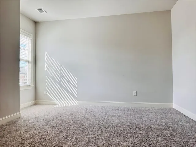 a view of a swimming pool with a lounge chairs