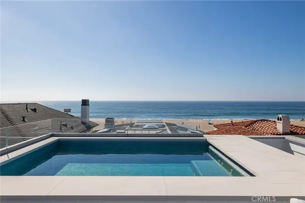 a view of a city with an ocean view