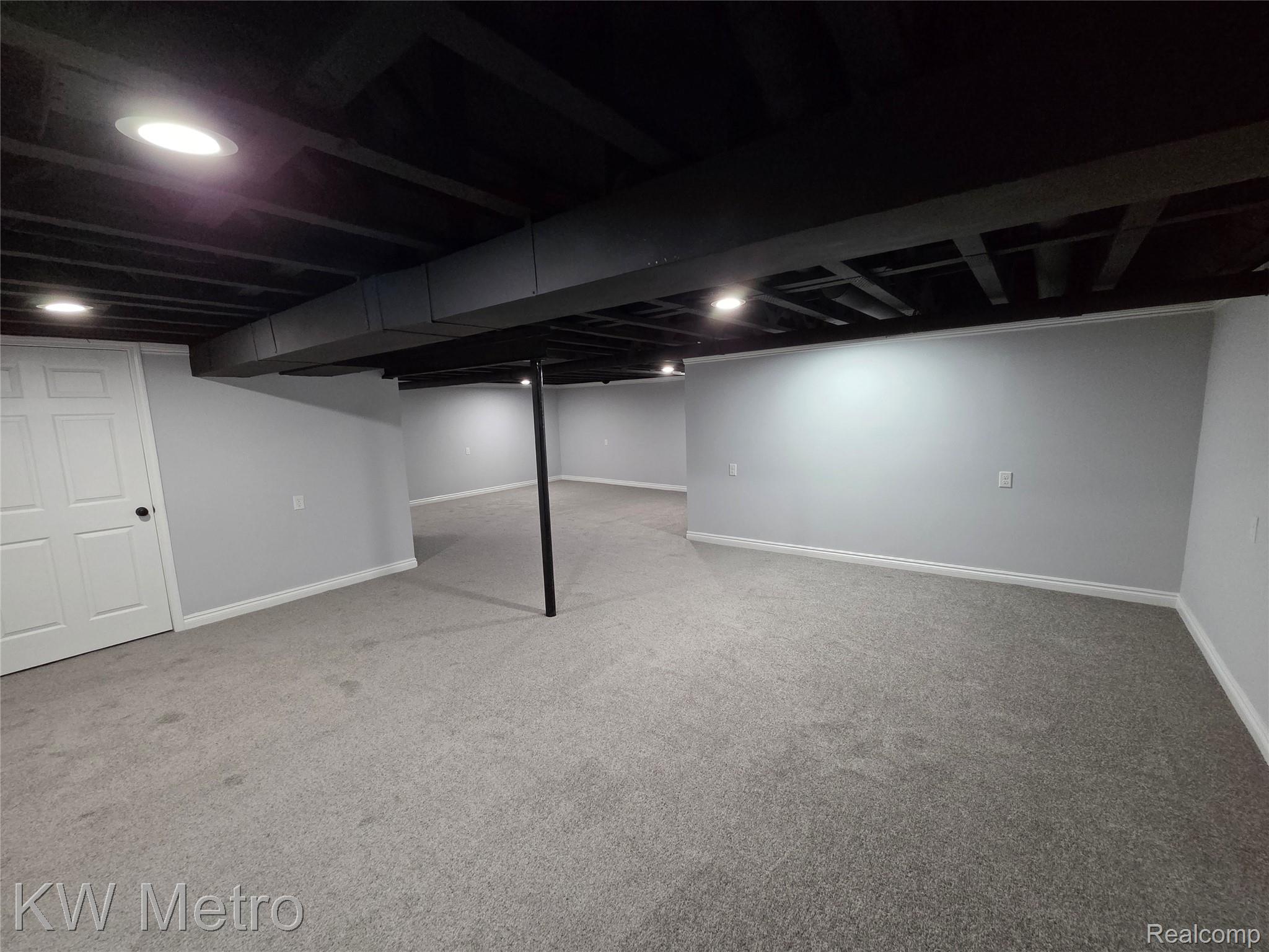 6680 Ridgefield Circle, Unit 104 West Bloomfield, MI 48322 - Photo 20 of 20 FINISHED BASMENT VIEW TWO