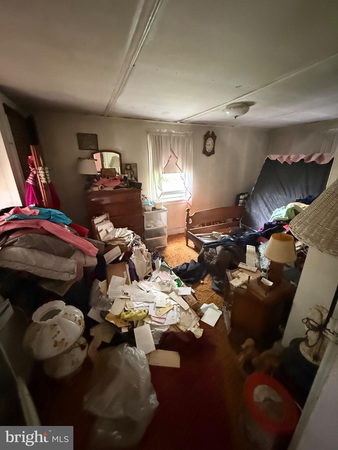 677 Monmouth Road Wrightstown, NJ 08562 - Photo 7 of 7 Cluttered room brimming with memories.