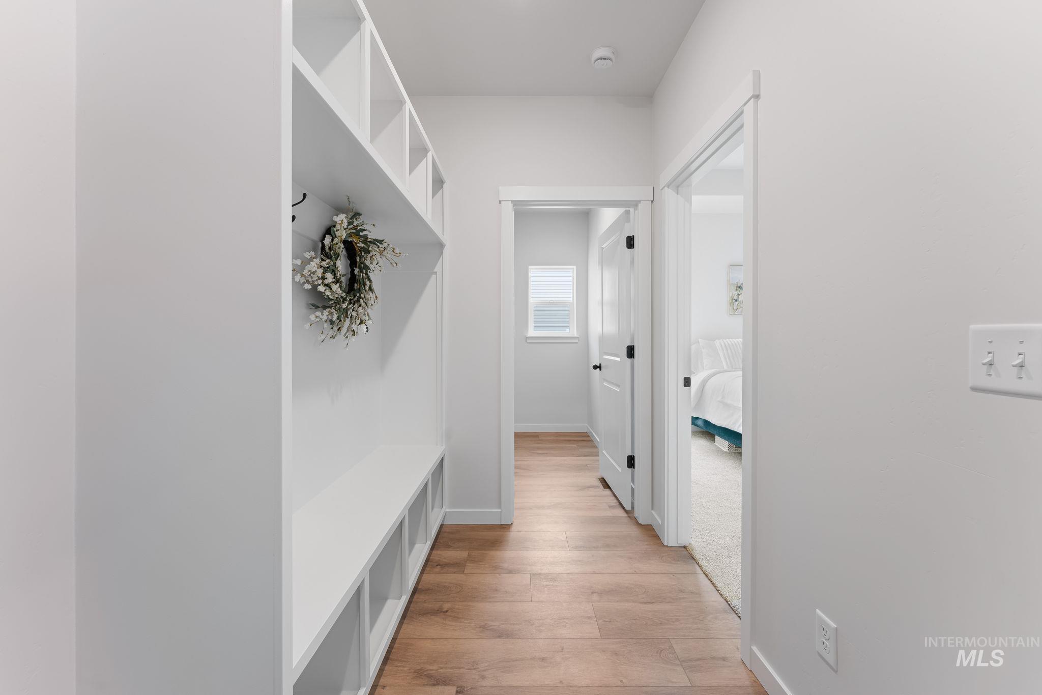 2220 Great Basin Way Burley, ID 83318 - Photo 26 of 39 Mudroom featuring light wood-style flooring and baseboards