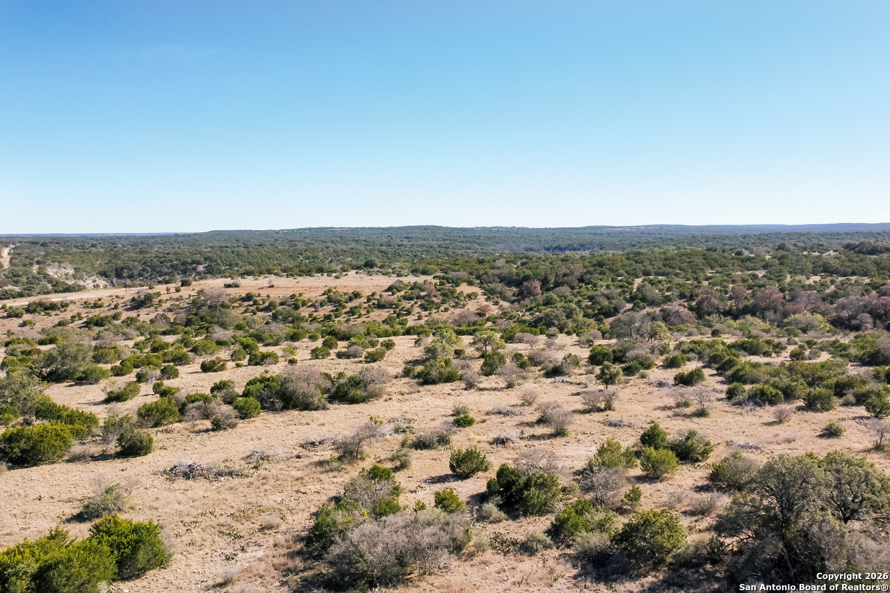 Lot 34 Spring Bluff Junction Junction, TX 76849 - Photo 3 of 16 an aerial view of residential houses with outdoor space