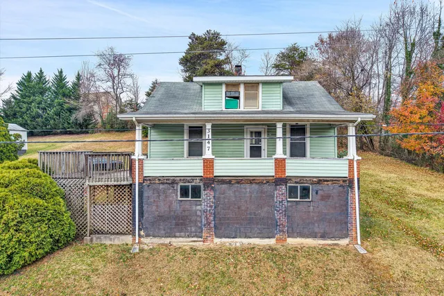 front view of house with a yard