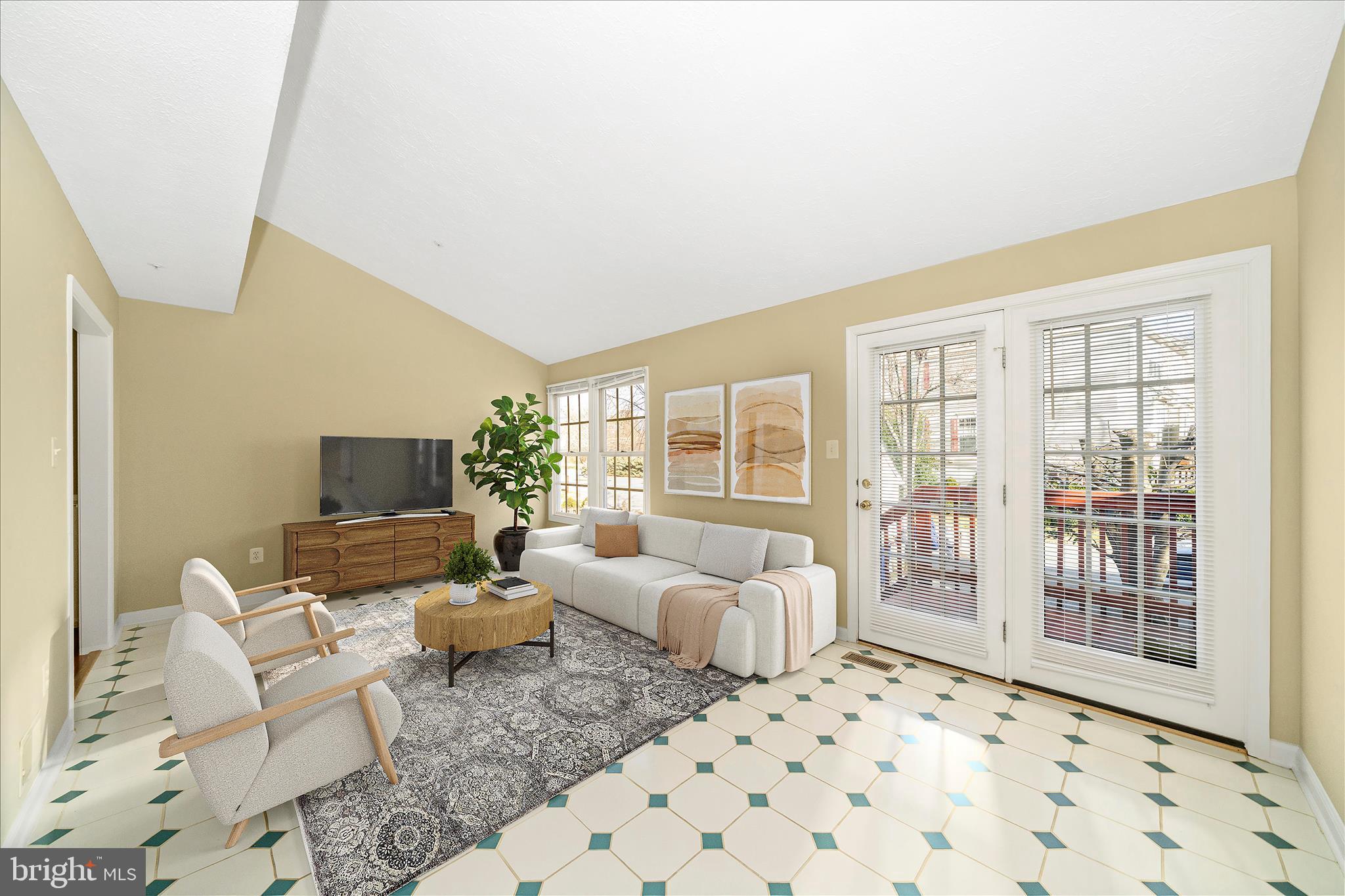 1810 Sebastian Boulevard Frederick, MD 21701 - Photo 12 of 28 a living room with furniture and a flat screen tv