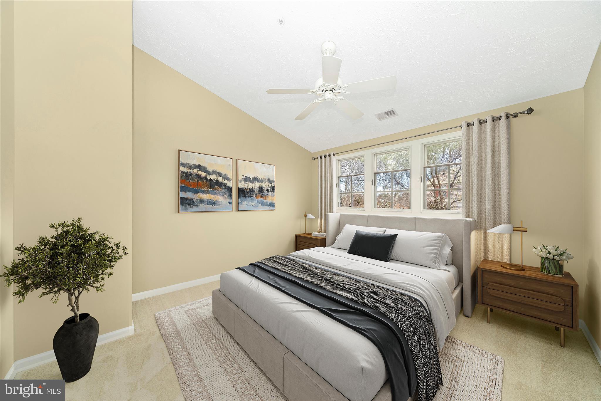 1810 Sebastian Boulevard Frederick, MD 21701 - Photo 17 of 28 a bedroom with a bed and a potted plant