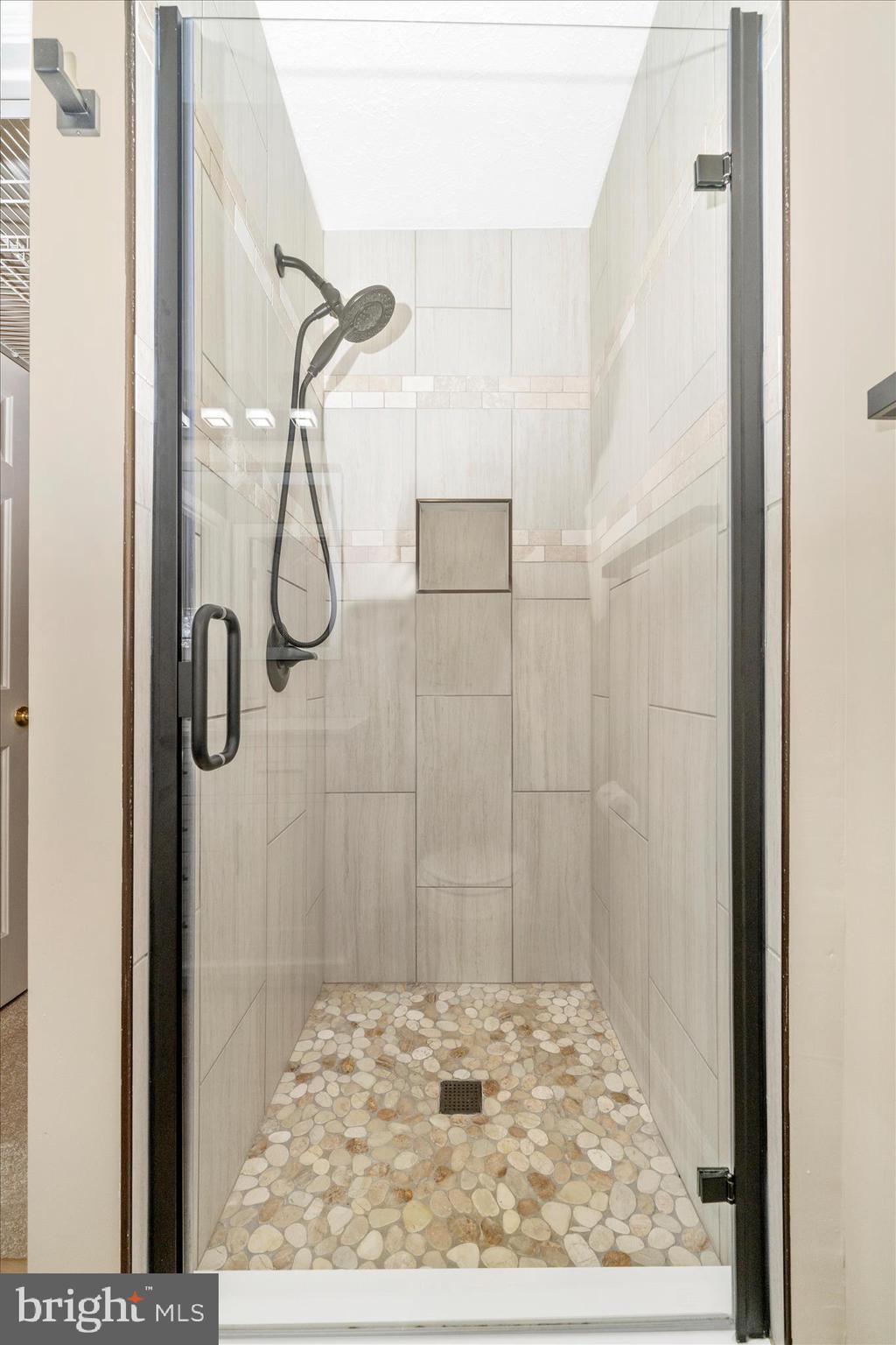 1810 Sebastian Boulevard Frederick, MD 21701 - Photo 18 of 28 a bathroom with a shower