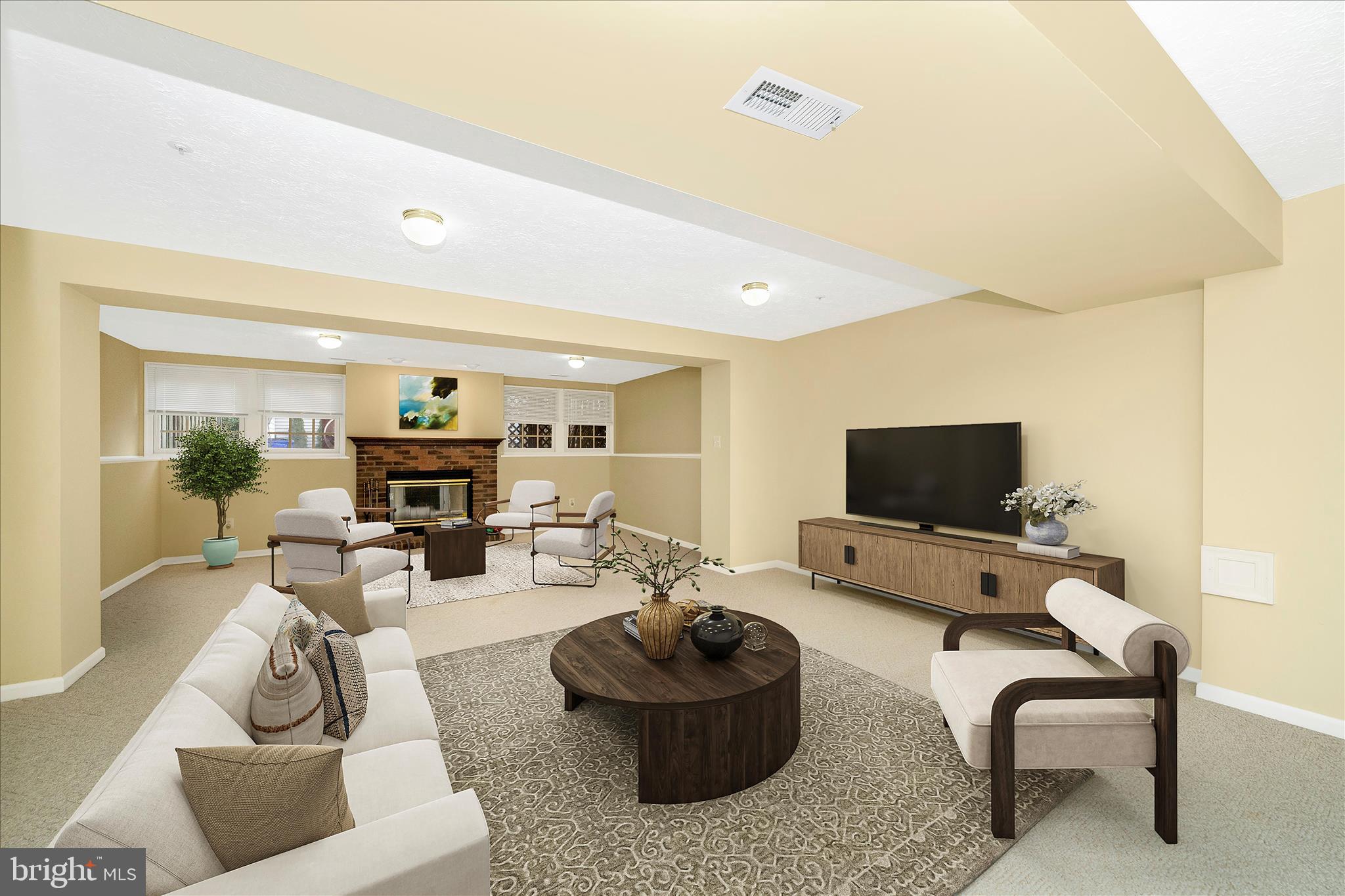 1810 Sebastian Boulevard Frederick, MD 21701 - Photo 20 of 28 a living room with furniture and a flat screen tv