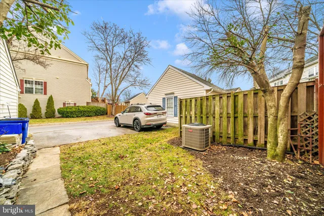a view of a backyard with a house