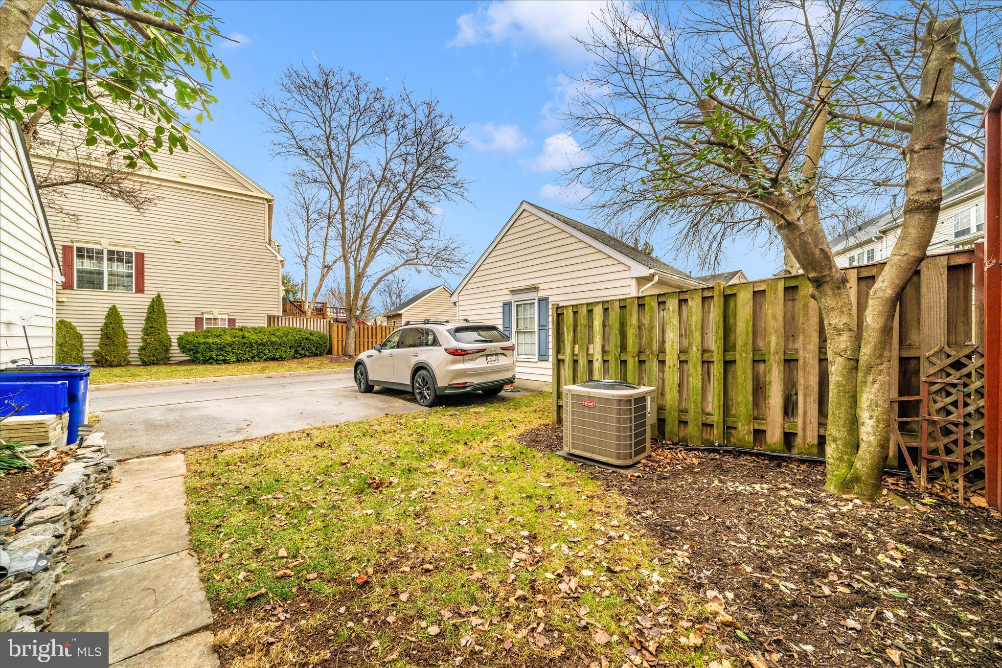 1810 Sebastian Boulevard Frederick, MD 21701 - Photo 27 of 28 a view of a patio with a table and chairs and potted plants
