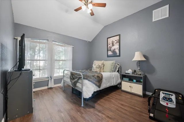 a bed room with a bed and a couch