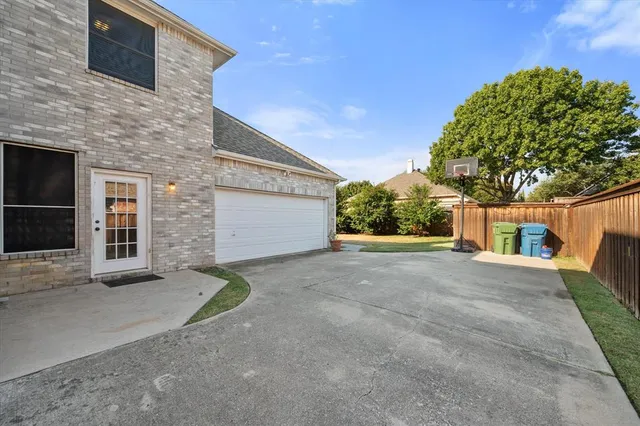 a view of a house with a street