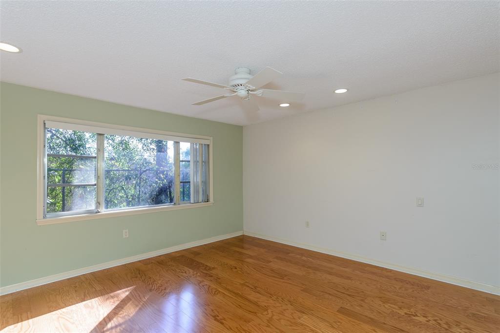 2101 Sunset Point Road, Unit 1003 Clearwater, FL 33765 - Photo 20 of 39 Primary Bedroom