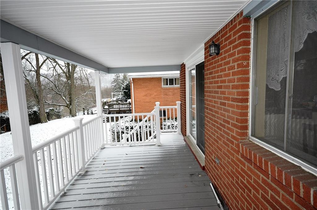 44 Elmwood Road Pittsburgh, PA 15209 - Photo 22 of 23 Porch is spacious and has steps to the yard below.