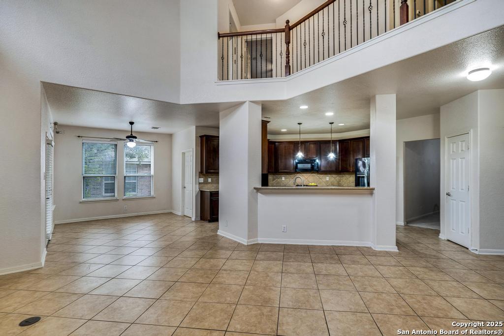 1934 Oak Flat Road San Antonio, TX 78251 - Photo 12 of 33 a view of a hallway with an empty room and window