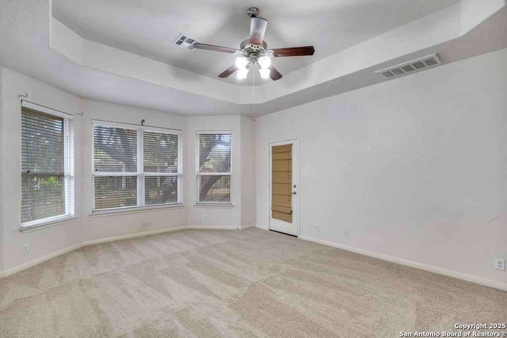 1934 Oak Flat Road San Antonio, TX 78251 - Photo 18 of 33 a view of an empty room with a window