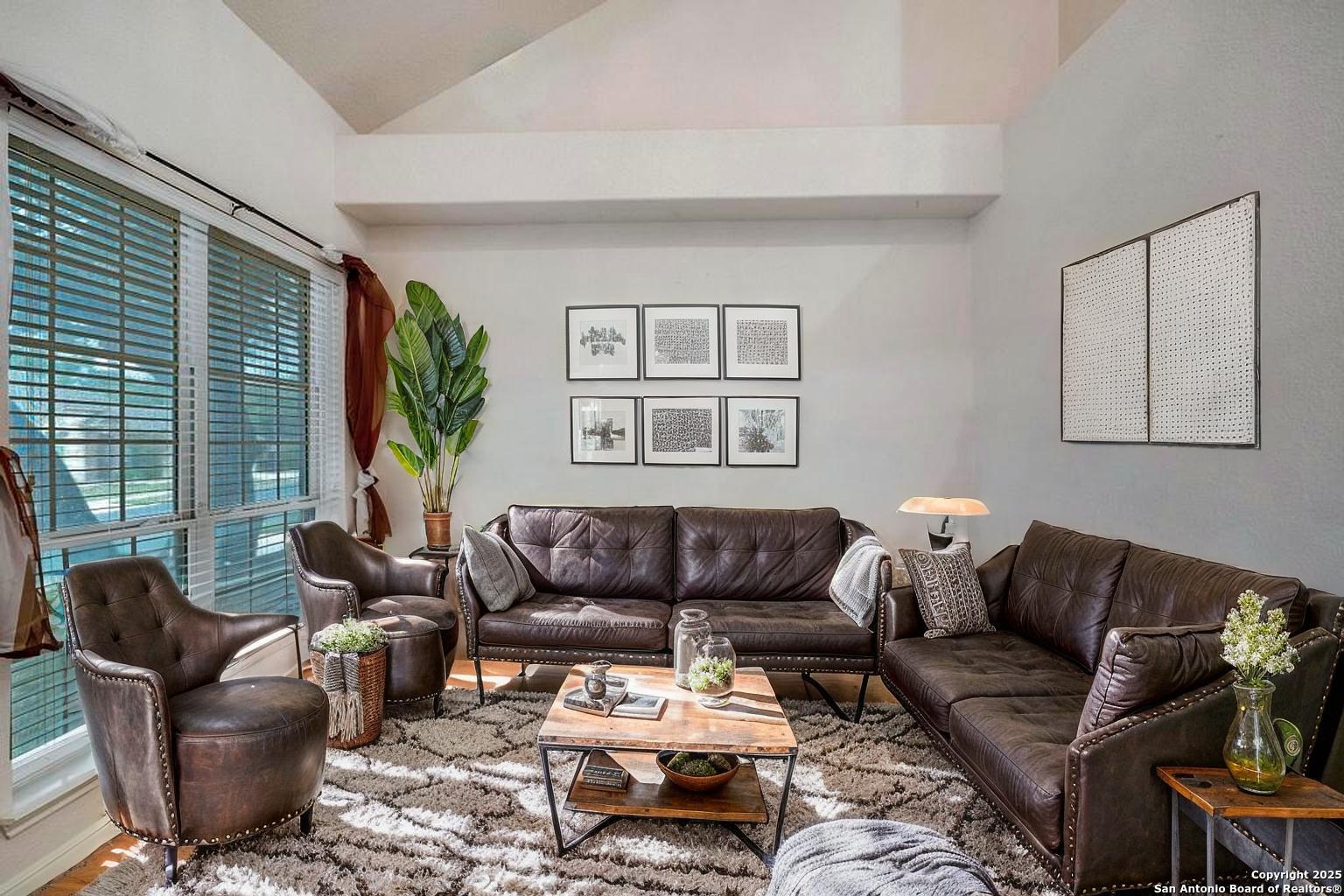1934 Oak Flat Road San Antonio, TX 78251 - Photo 7 of 33 a living room with furniture ceiling fan and a window
