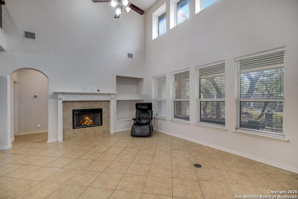 1934 Oak Flat Road San Antonio, TX 78251 - Photo 10 of 33 a living room with furniture and a fireplace
