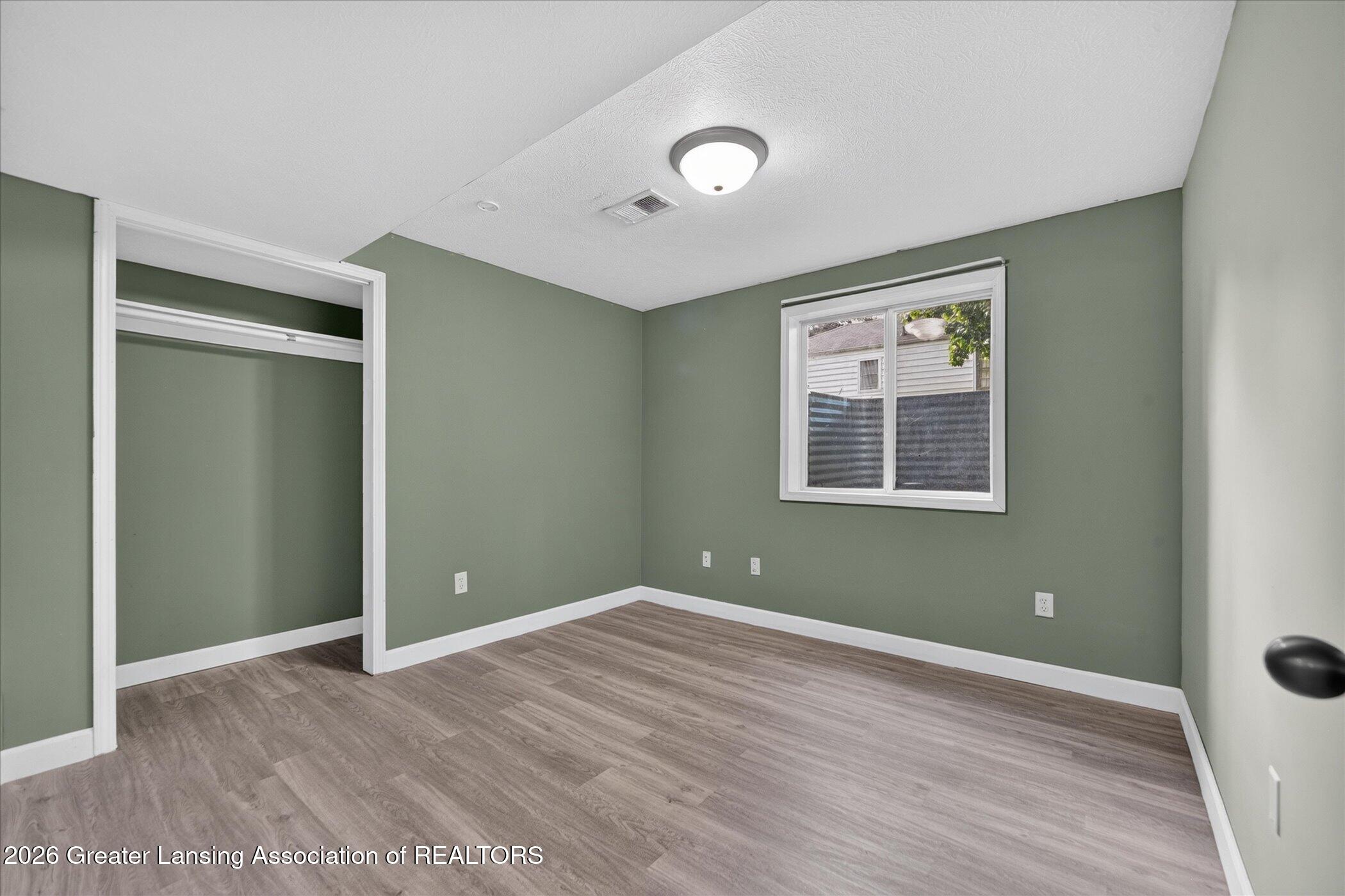 5855 Edson Street Haslett, MI 48840 - Photo 27 of 38 29-5855-Edson-St-WindowStill