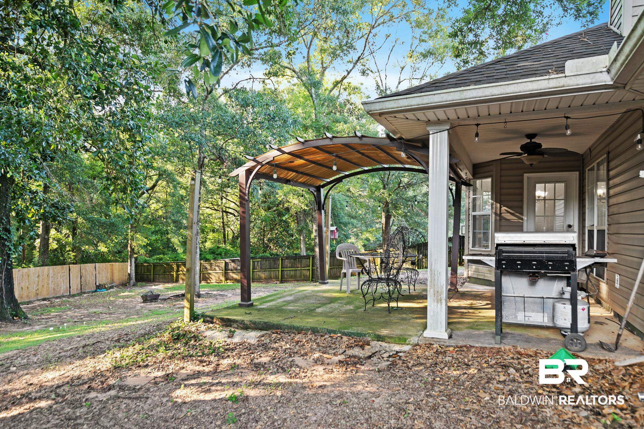 10550 Patrick Avenue Grand Bay, AL 36541 - Photo 39 of 43 View of yard with a patio and ceiling fan