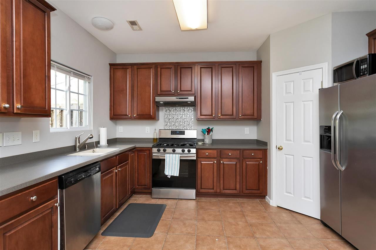 3370 Bridgeville Road Raleigh, NC 27610 - Photo 11 of 30 Lots of counter space and cabinets make for a well-organized chef! Don't miss the pantry. Kitchen