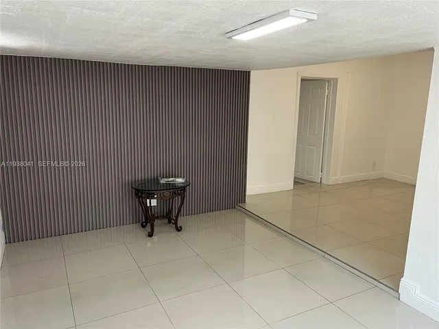 a view of a livingroom with furniture