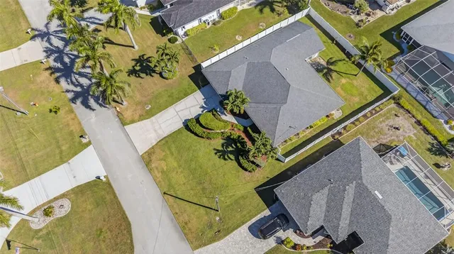 an aerial view of a house with a garden