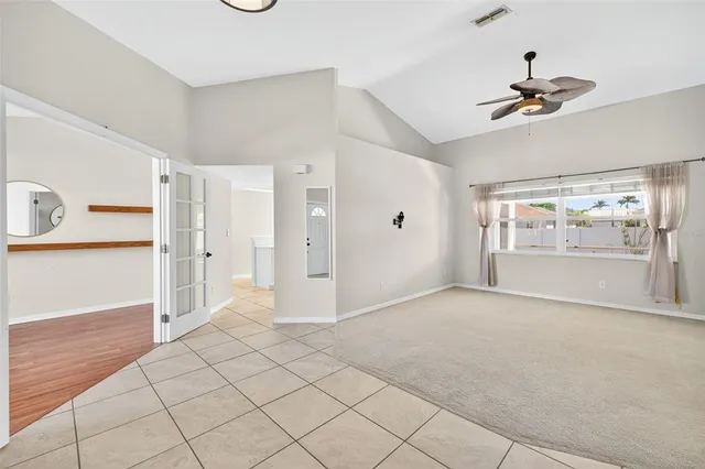 a view of an empty room and window