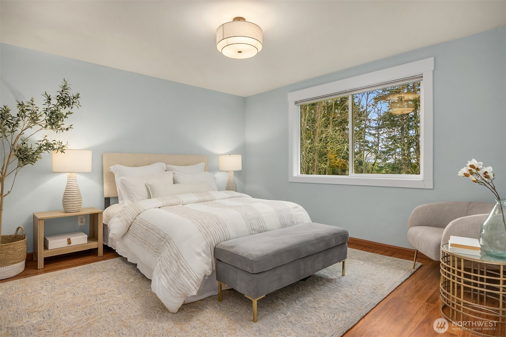 9280 Northeast Lovgreen Road Bainbridge Island, WA 98110 - Photo 15 of 40 a bedroom with a bed and a window