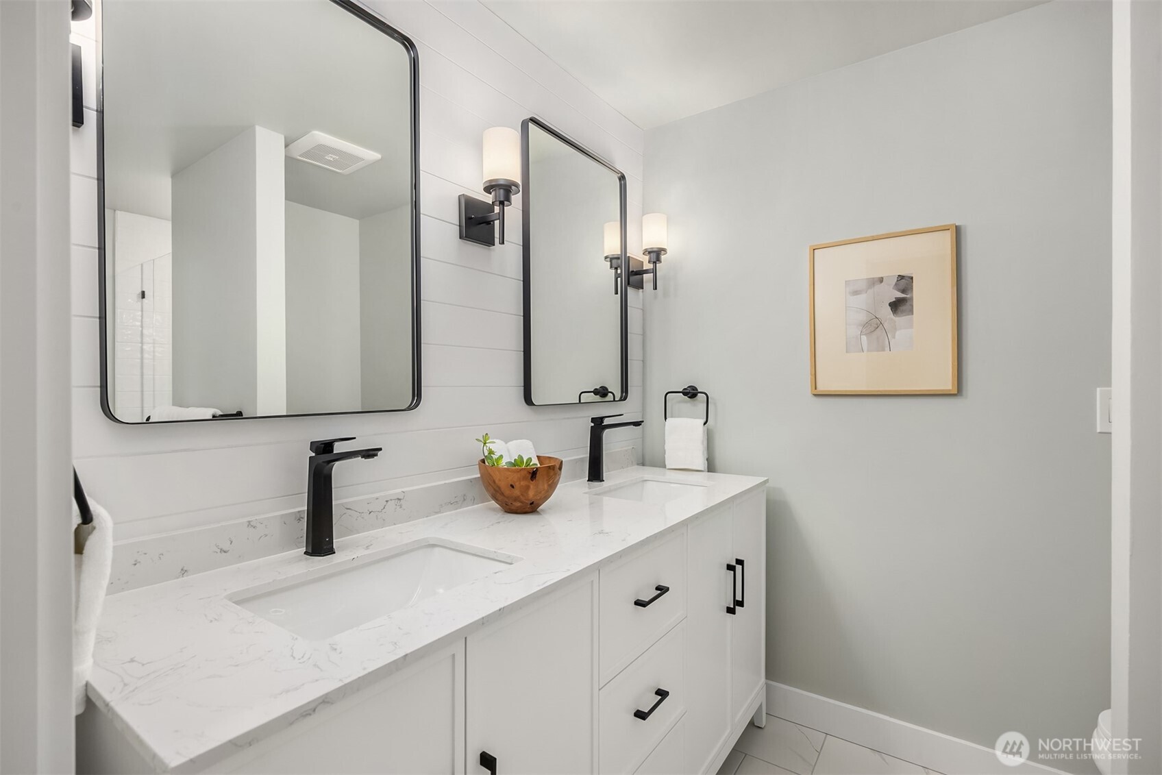 9280 Northeast Lovgreen Road Bainbridge Island, WA 98110 - Photo 17 of 40 a bathroom with a sink and a mirror