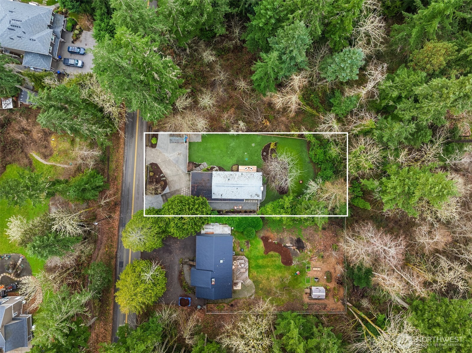 9280 Northeast Lovgreen Road Bainbridge Island, WA 98110 - Photo 36 of 40 an aerial view of a house with outdoor space