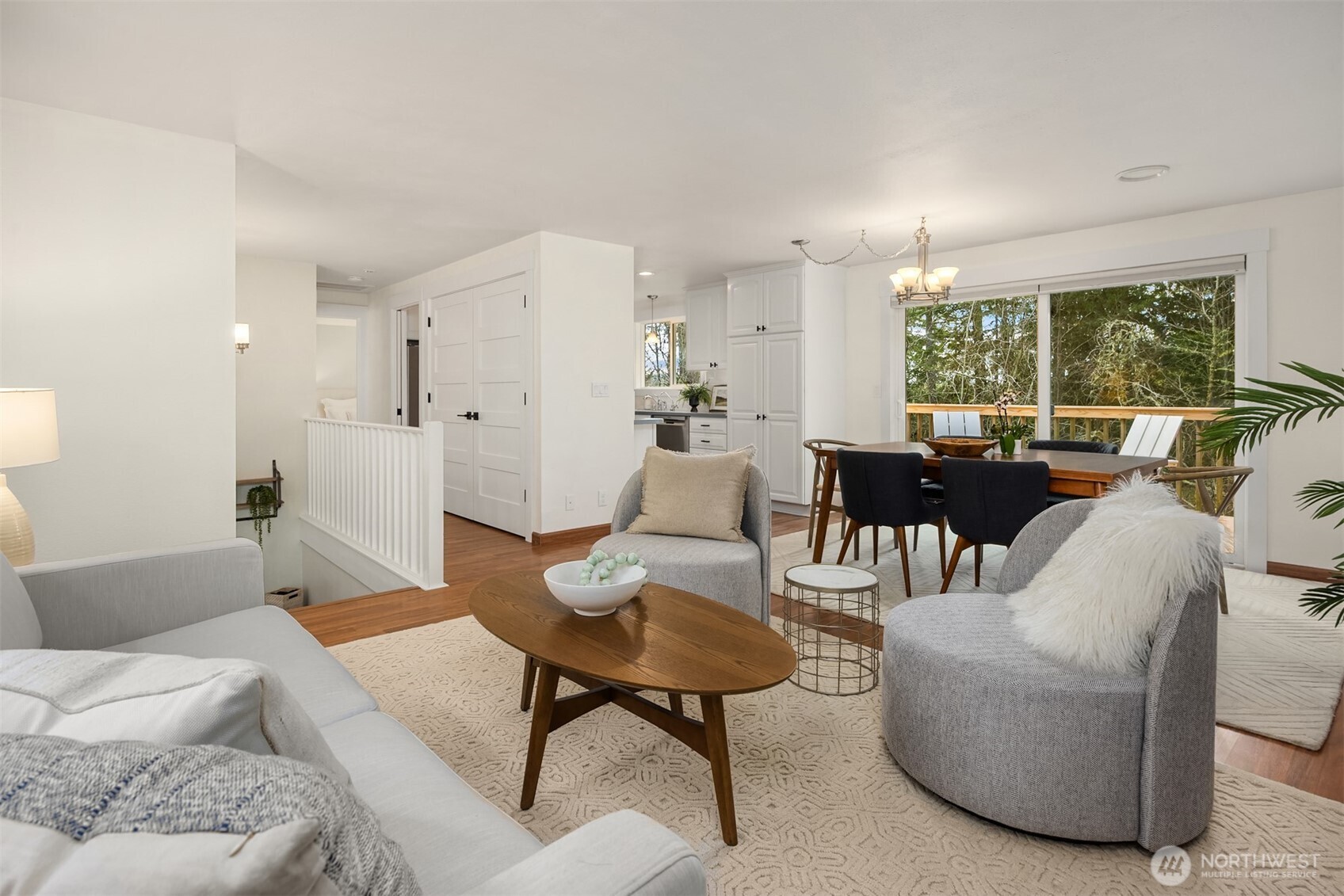 9280 Northeast Lovgreen Road Bainbridge Island, WA 98110 - Photo 5 of 40 a living room with furniture and a large window