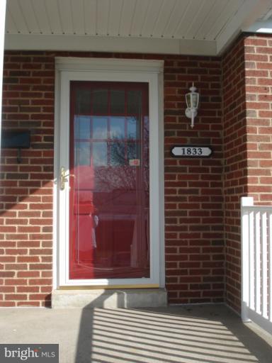 1833 Hanford Road Rosedale, MD 21237 - Photo 1 of 26 a view of front door of house