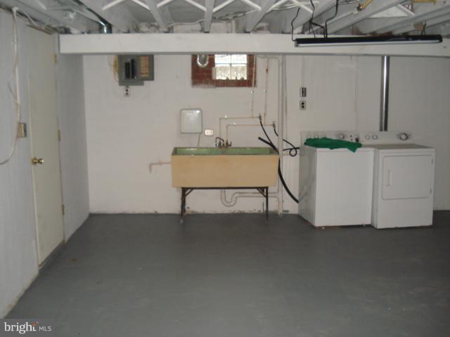 1833 Hanford Road Rosedale, MD 21237 - Photo 14 of 26 a room with table and chairs