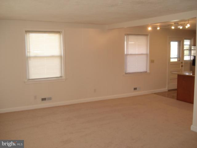 1833 Hanford Road Rosedale, MD 21237 - Photo 20 of 26 an empty room with windows