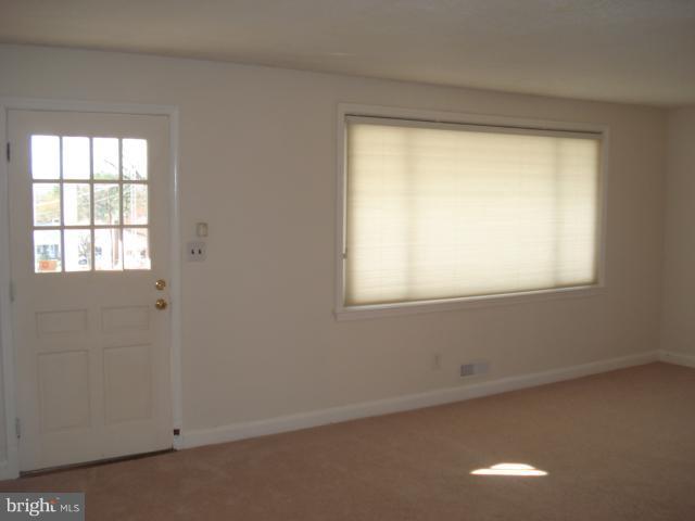 1833 Hanford Road Rosedale, MD 21237 - Photo 21 of 26 a view of an empty room with a window